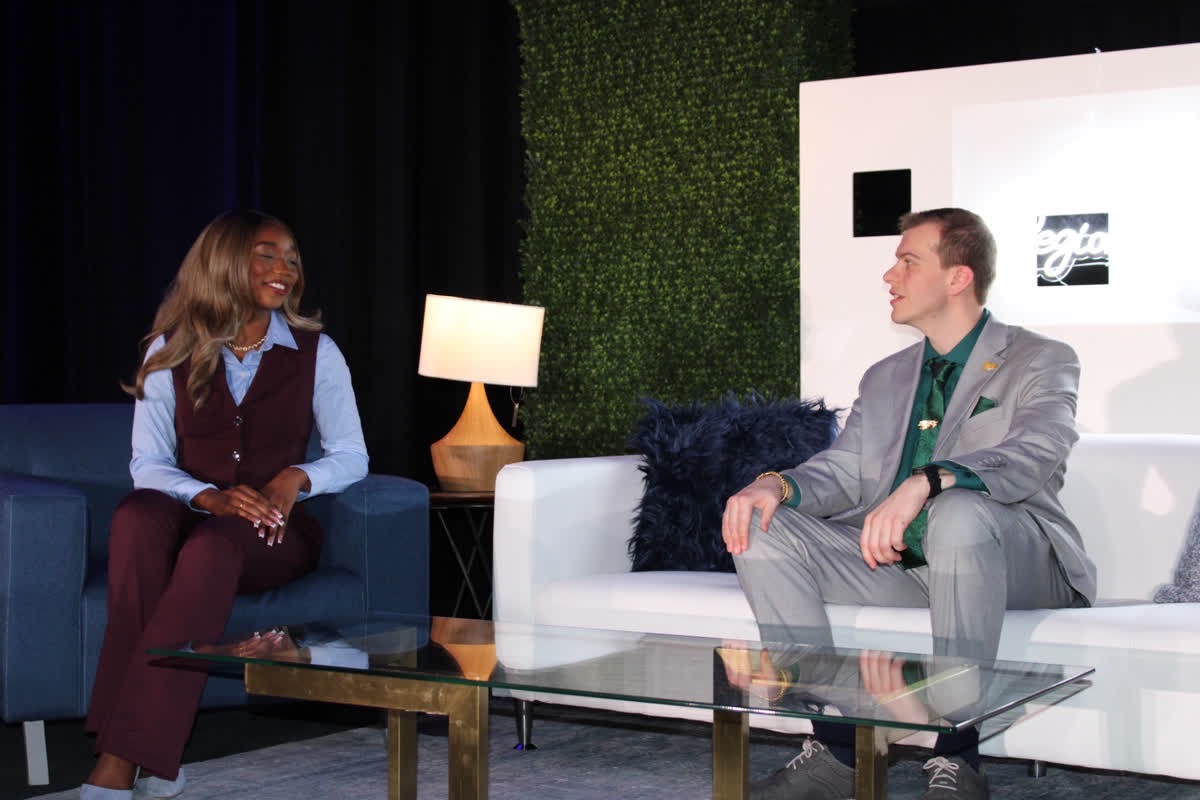 Tiber and Laurel team members in conversation on stage at event