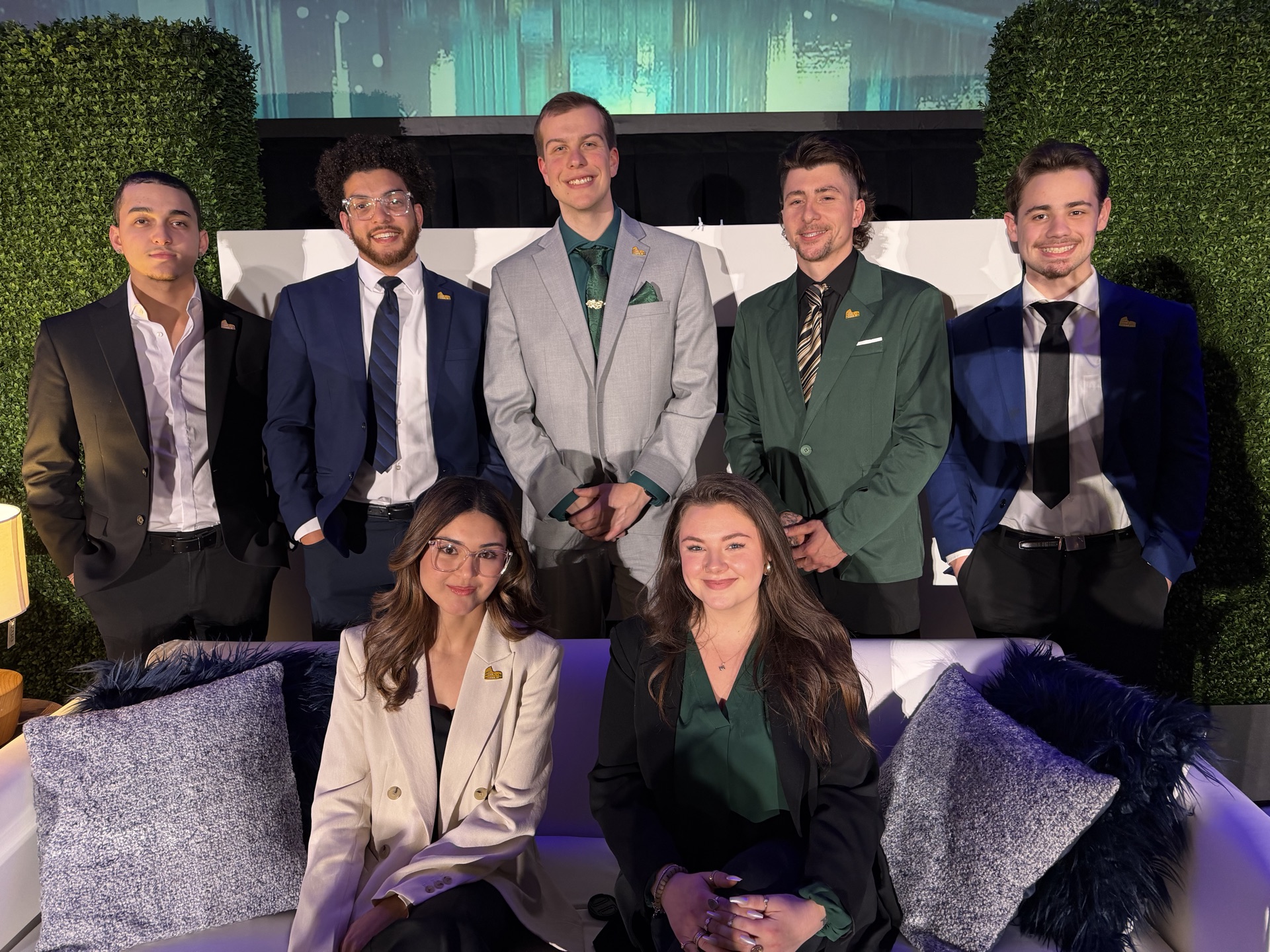 Tiber and Laurel team at formal company event